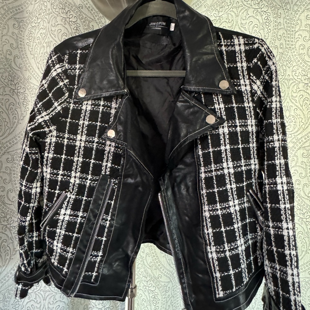 Jacket with leather sleeves